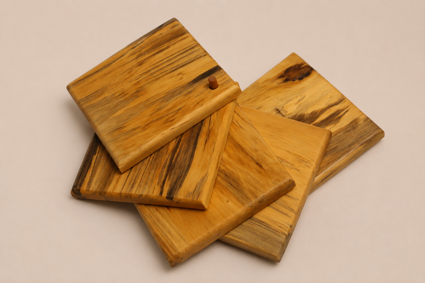 Set of five handcrafted hardwood coasters